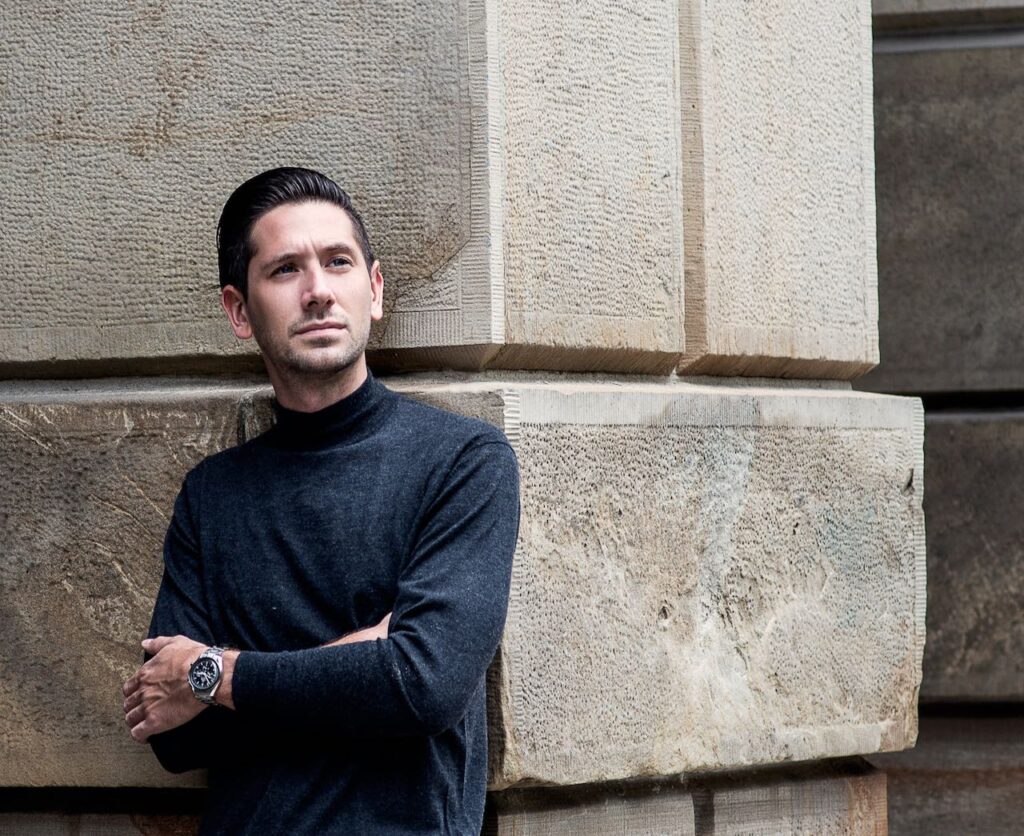 man with crossed arms